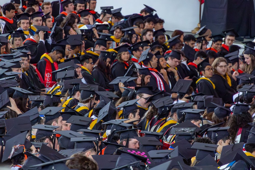 Graduation crowd in caps and gowns